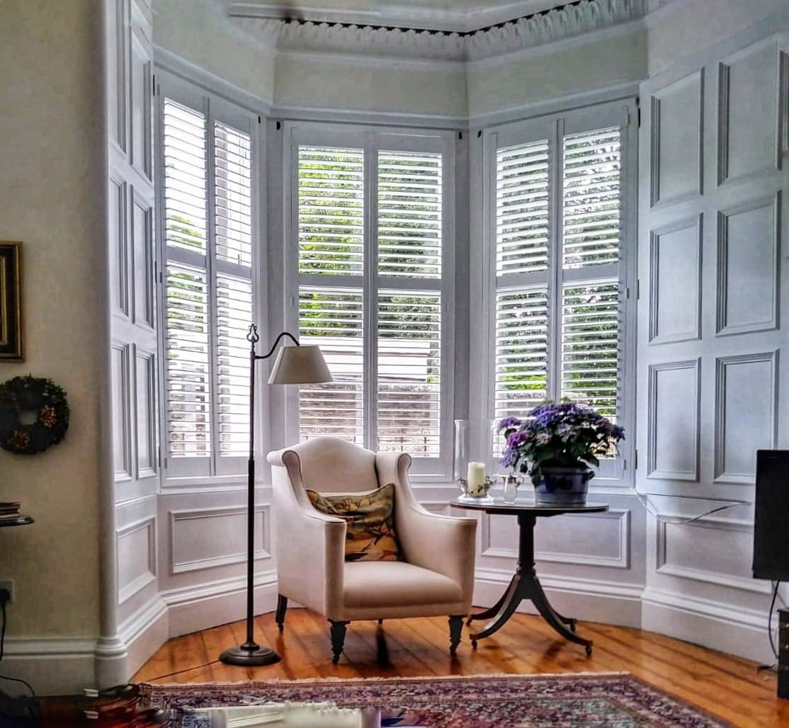 Made-to-measure bay window plantation shutters fitted in a London home